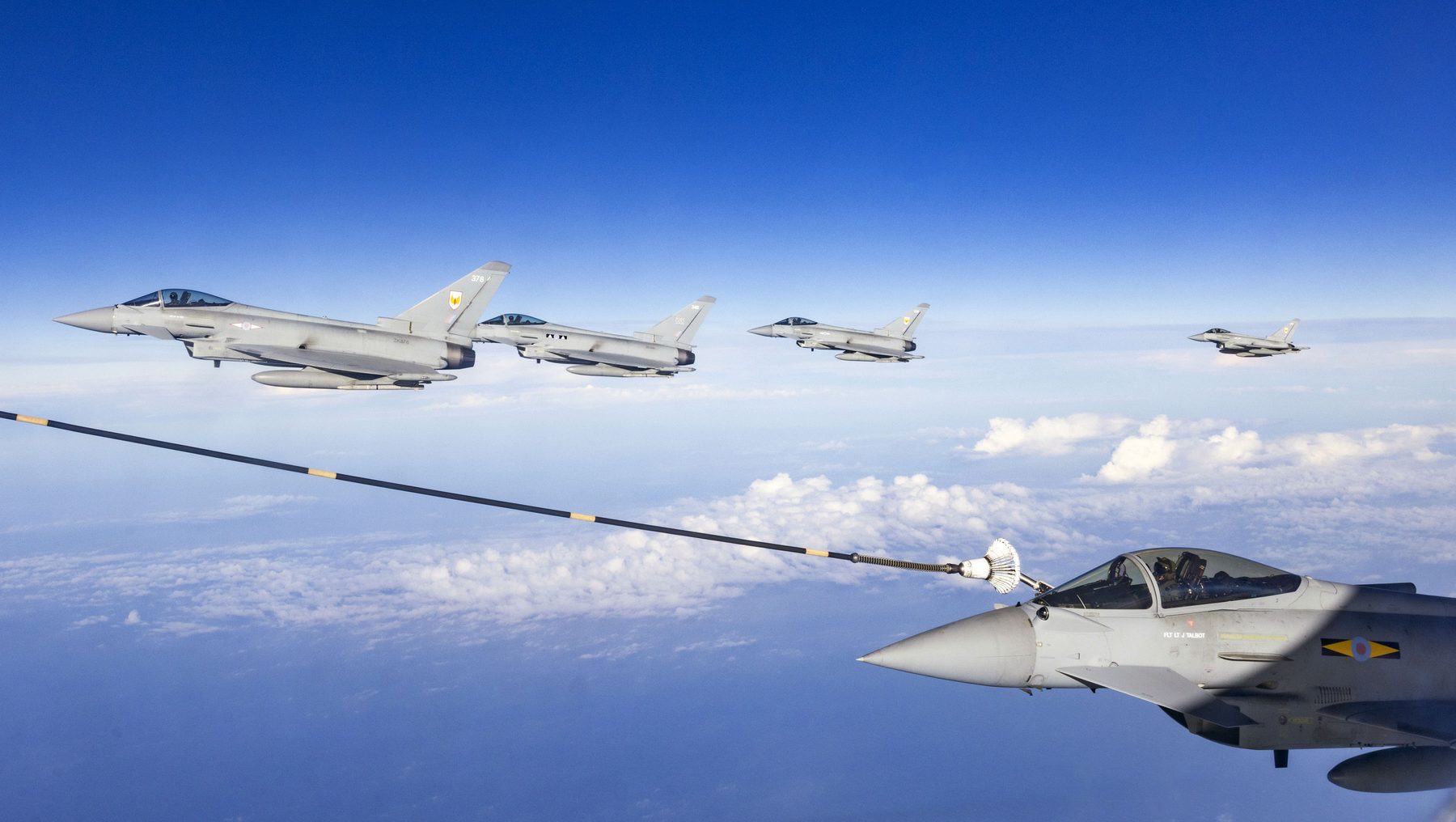 RAF Voyager refuelling Typhoon aircraft en route to Exercise Red Flag